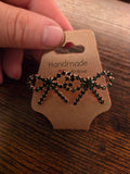 Emerald Elegance Bow Studs